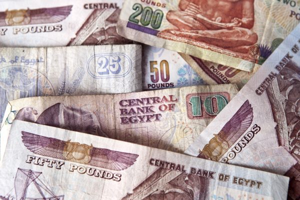 Egyptian pound bank notes are arranged for a photograph in Cairo, Egypt, on Thursday, Feb. 3, 2011. The protests, which started on Jan. 25, forced Egypt to delay plans to raise 4 million pounds ($683 million) from two debt sales this week. Photographer: Andrew Burton/Bloomberg