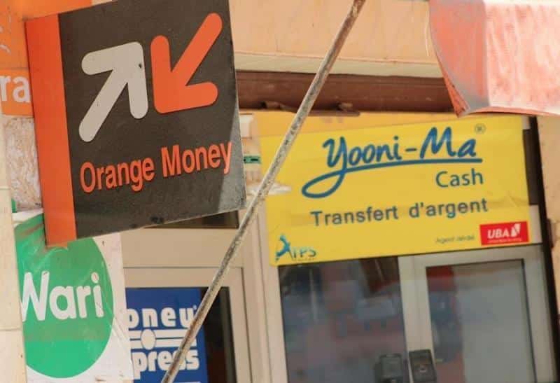 Transfert d’argent au Sénégal : Orange Money et Wari se disputent le leadership en milieu rural